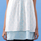 Front Detail of a Model wearing Powder Blue Block Printed V-Neck Tunic Top