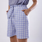 Left View of a Model wearing Powder Blue Checkered Handspun Shorts
