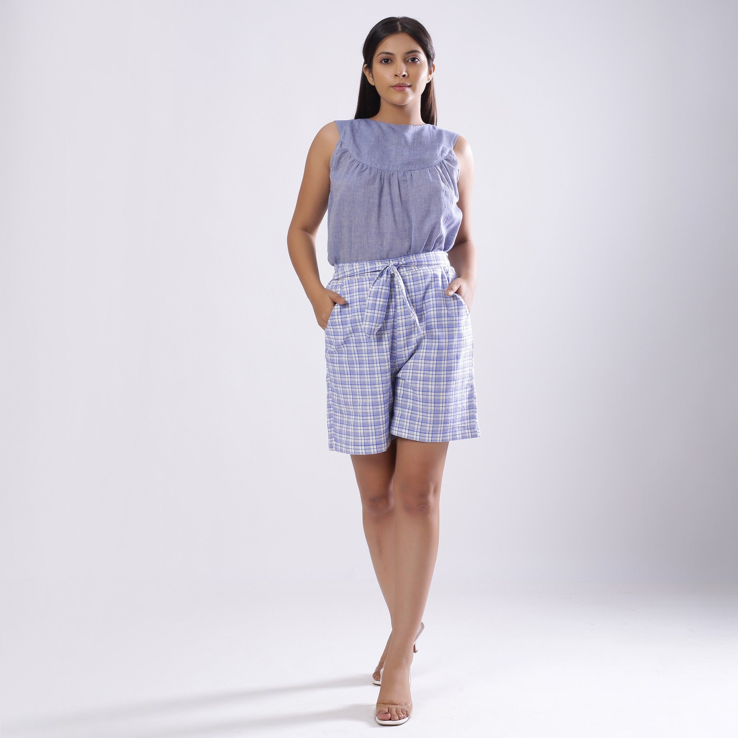 Front View of a Model wearing Powder Blue Checkered Handspun Shorts