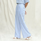 Left View of a Model wearing Powder Blue Checks Cotton High-Rise Wide Legged Pant