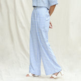 Left View of a Model wearing Powder Blue Checks Cotton High-Rise Wide Legged Pant