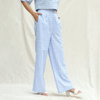 Right View of a Model wearing Powder Blue Checks Cotton High-Rise Wide Legged Pant