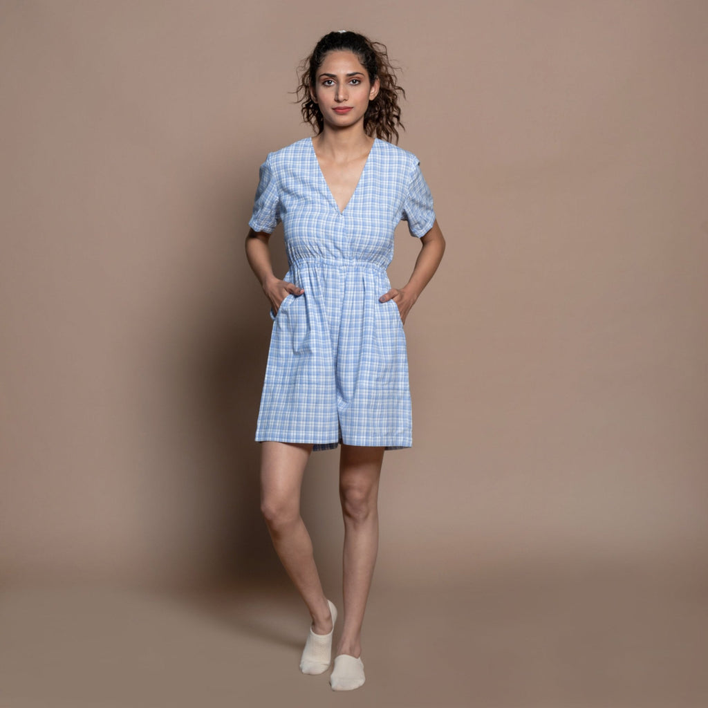 Front View of a Model wearing Powder Blue Checks Handspun Cotton Short Playsuit