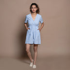 Front View of a Model wearing Powder Blue Checks Handspun Cotton Short Playsuit