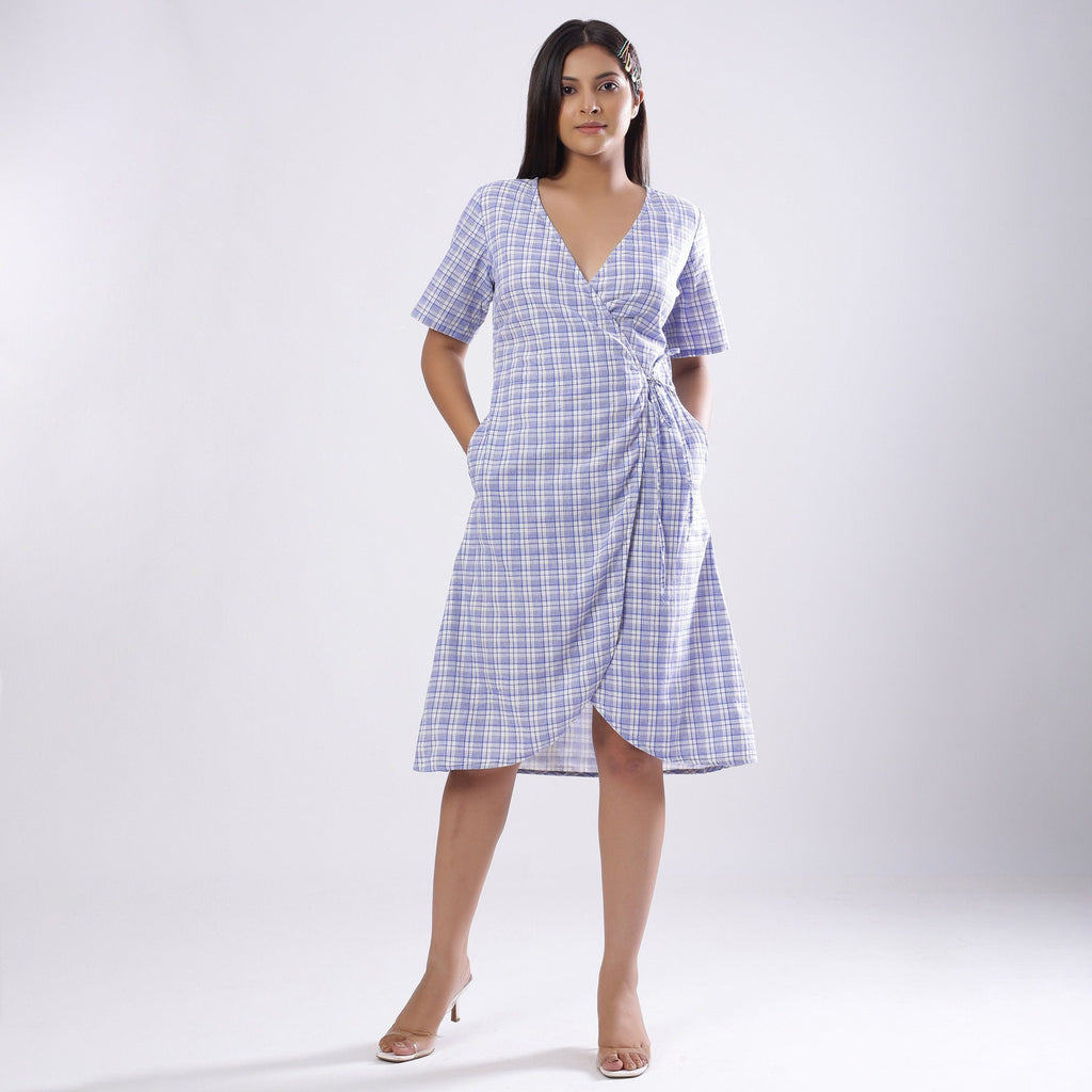 Front View of a Model wearing Powder Blue Handspun Plunge Neck Wrap Dress