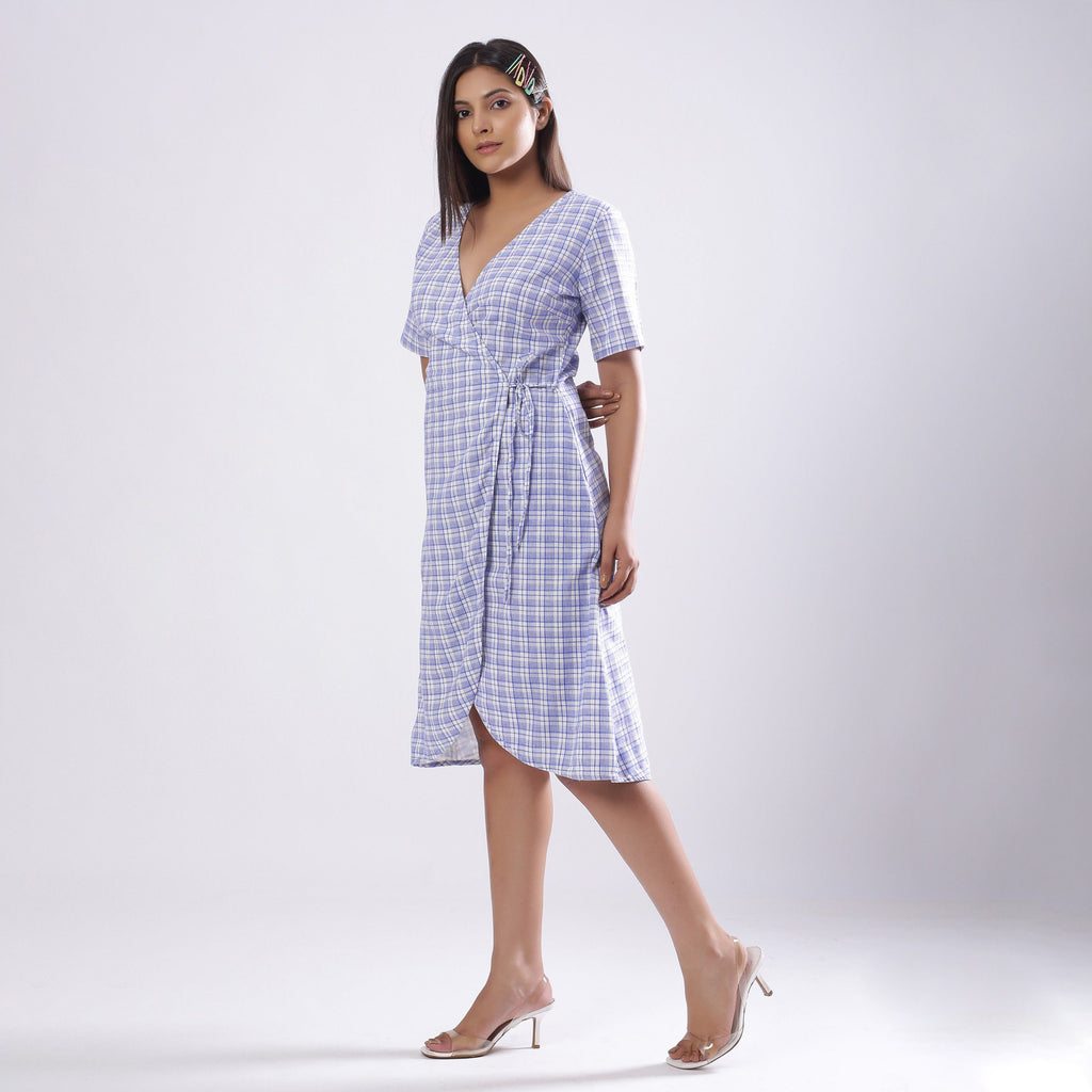 Front View of a Model wearing Powder Blue Handspun Plunge Neck Wrap Dress