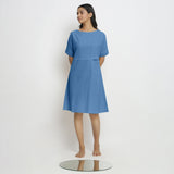 Front View of a Model wearing Powder Blue Handspun Vegetable Dyed Yoked Dress