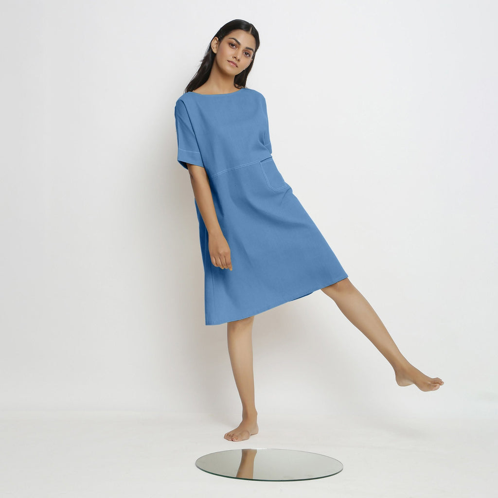 Front View of a Model wearing Powder Blue Handspun Vegetable Dyed Yoked Dress