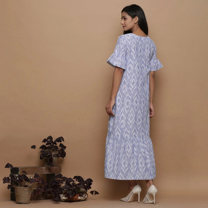 Back View of a Model wearing Blue Handwoven Cotton Button-Down Dress