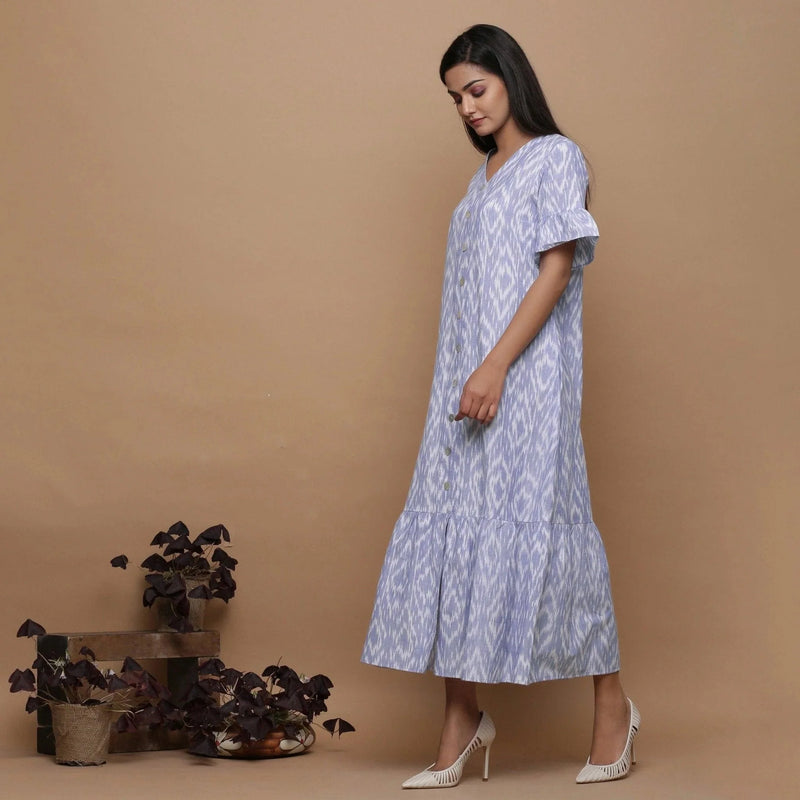 Left View of a Model wearing Blue Handwoven Cotton Button-Down Dress