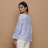 Back View of a Model wearing Handwoven Cotton Raglan Sleeves Straight Top