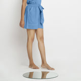 Right View of a Model wearing Powder Blue Vegetable Dyed Handspun Short Shorts