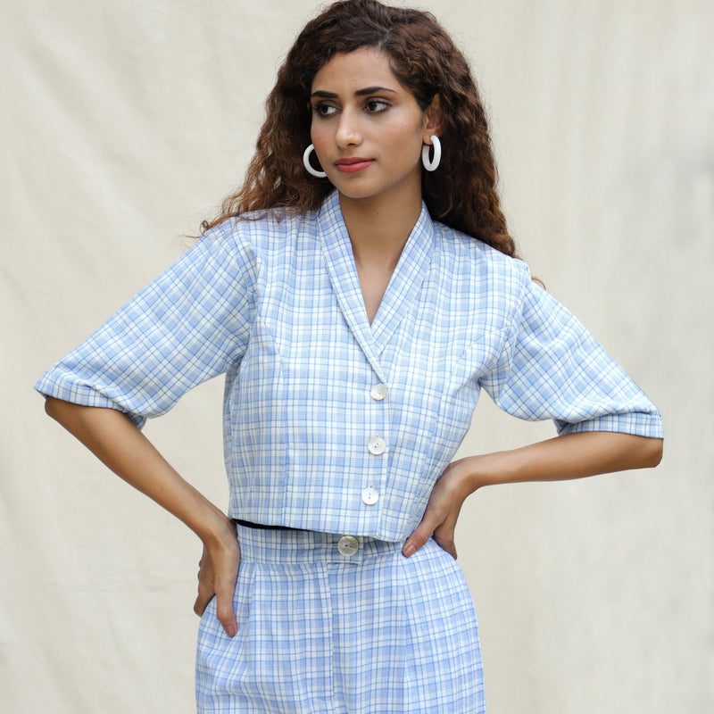 Front View of a Model wearing Powder Blue Checkered Handspun Cotton Short Jacket