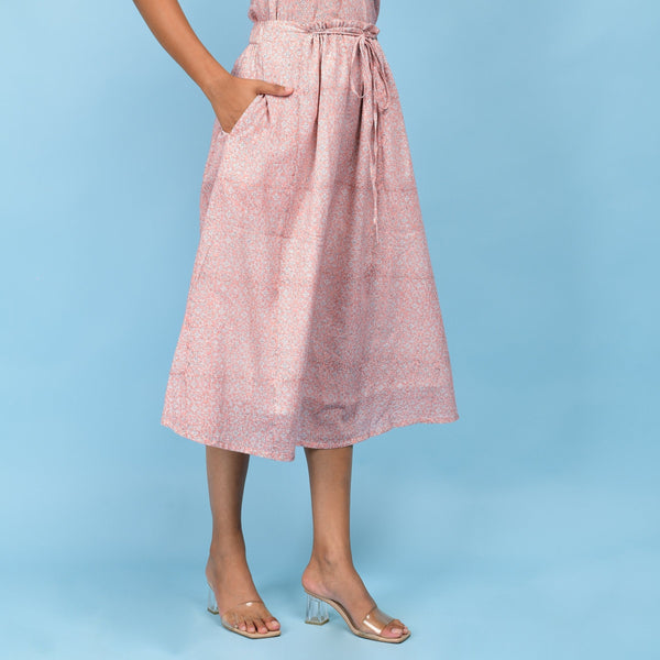 Right View of a Model wearing Powder Pink Paisley Block Printed Cotton Midi Skirt