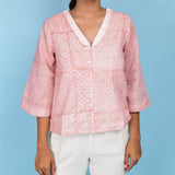 Front Detail of a Model wearing Powder Pink Block Printed Chelsea Collar Cotton Top