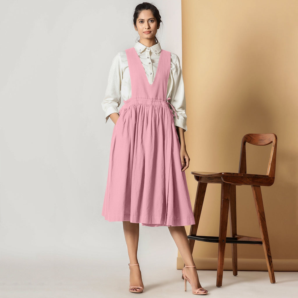 Front View of a Model wearing Powder Pink Cotton Flax Pinafore Midi Wrap Dress