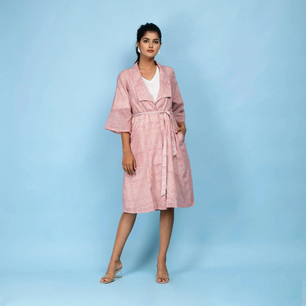 Front View of a Model wearing Powder Pink Block Printed 100% Cotton Knee-Length Overlay