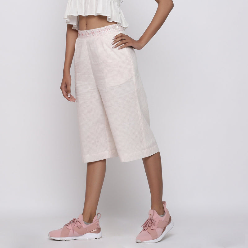 Left View of a Model wearing Powder Pink Mid Rise Straight Culottes