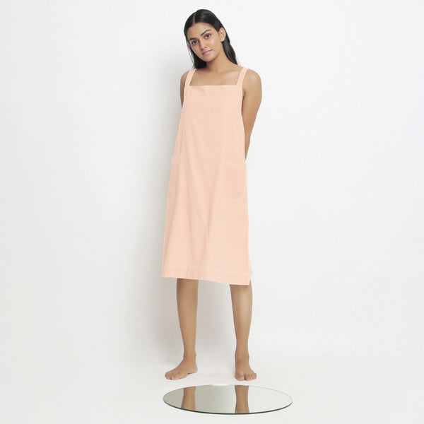 Front View of a Model wearing Powder Pink Vegetable Dyed Handspun Slip Dress