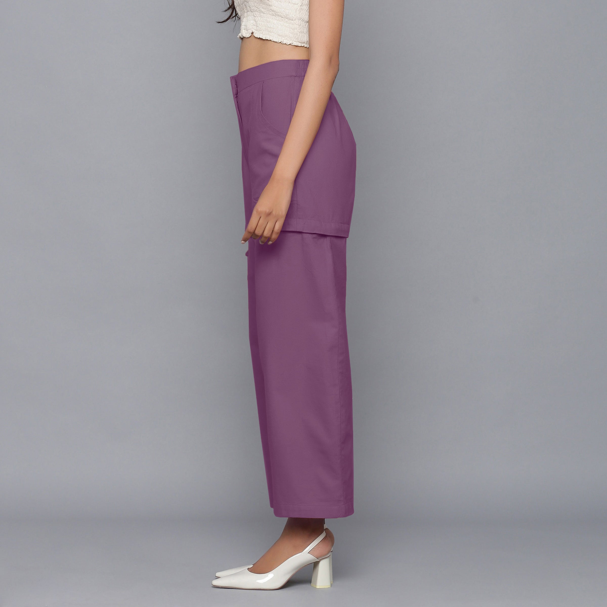 Left View of a Model wearing Purple Flannel Convertible Pant Shorts