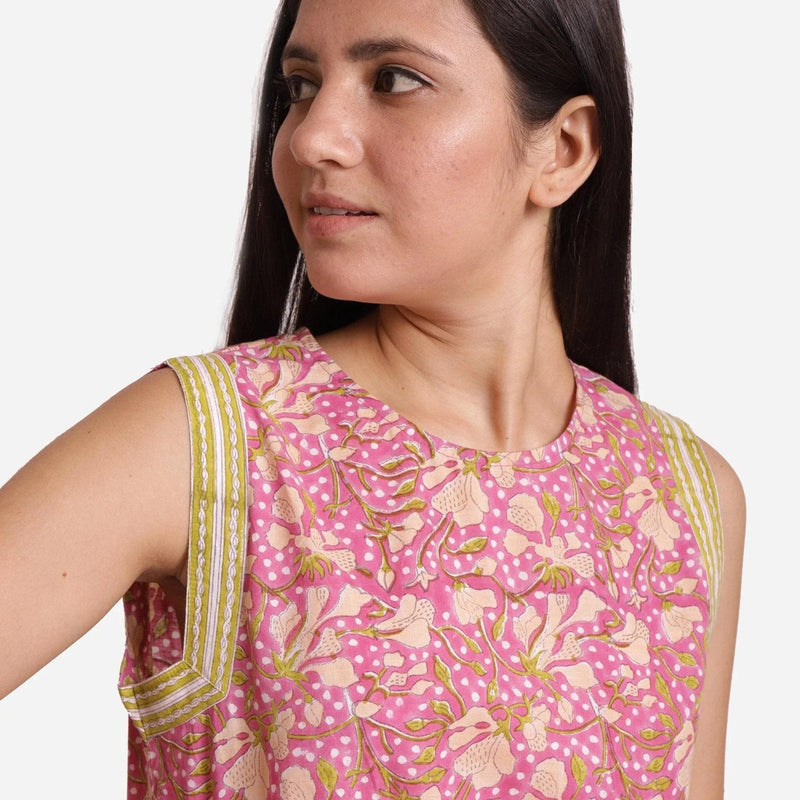 Front Detail of a Model wearing Purple Floral Block Print Short Cotton Top