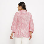 Back View of a Model wearing Red Crinkled Cotton Pussy Bow A-Line Blouse