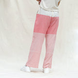 Back View of a Model wearing Red and Beige Striped 100% Cotton Mid-Rise Elasticated Straight Pant