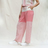 Left View of a Model wearing Red and Beige Striped 100% Cotton Mid-Rise Elasticated Straight Pant