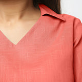 Front Detail of a Model wearing Red Bracelet Sleeve Straight Top