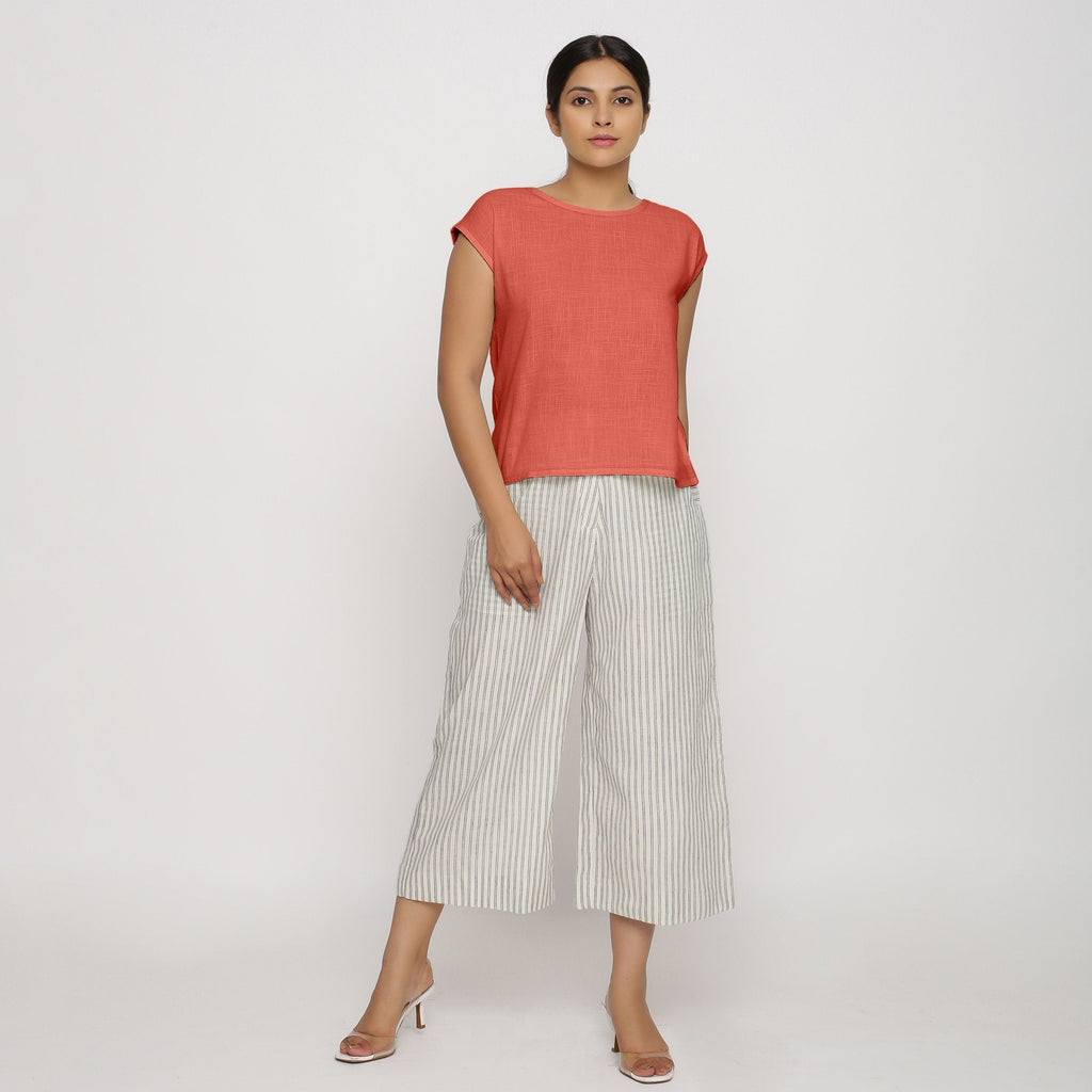 Front View of a Model wearing Red Cotton Slub Straight Top