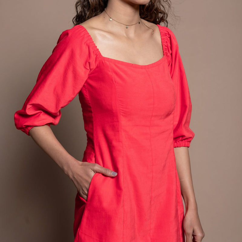 Front Detail of a Model wearing Red Cotton Velvet Sweetheart Neck Short Paneled Dress