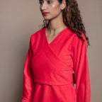 Front Detail of a Model wearing Red 100% Cotton Velvet Knee Length Wrap Dress
