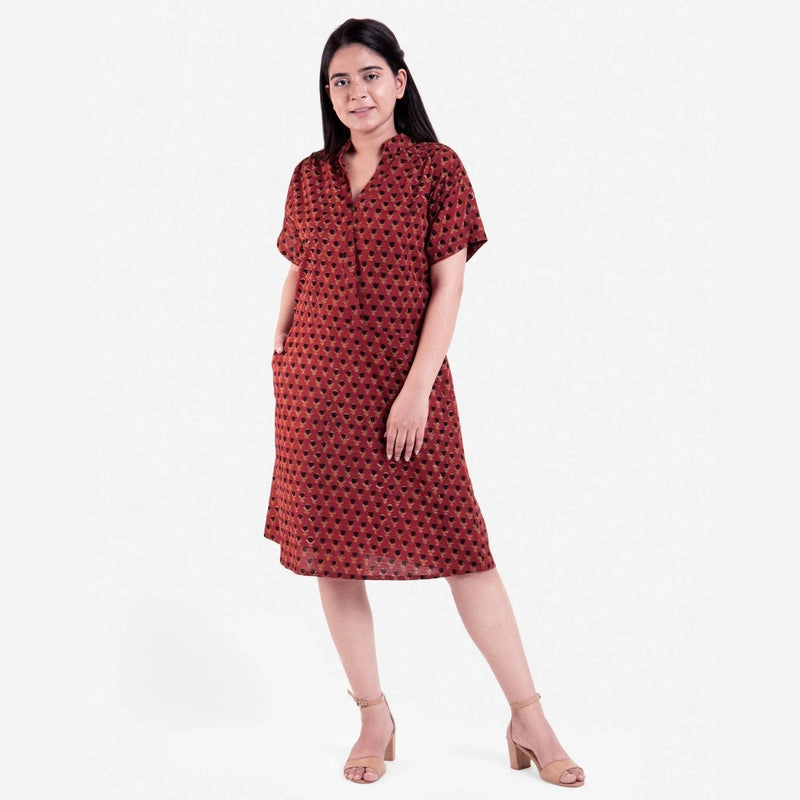 Front View of a Model wearing Red Floral Block Printed Cotton Knee Length Shirt Dress