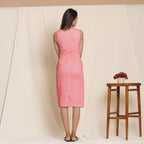 Back View of a Model wearing Red Knee Length Cotton Sheath Dress