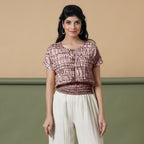Front View of a Model wearing Red Shibori Tie-Dyed 100% Cotton Blouson Top
