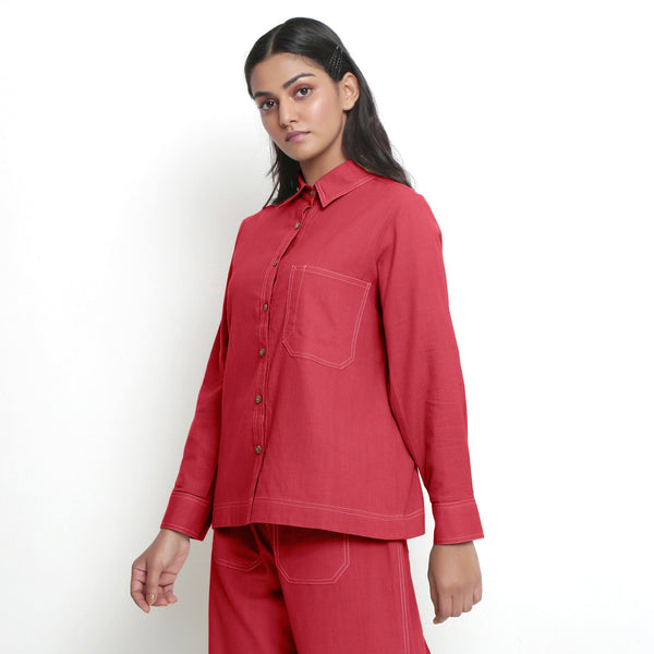 Left View of a Model wearing Red Vegetable Dyed Handspun Cotton Button-Down Top