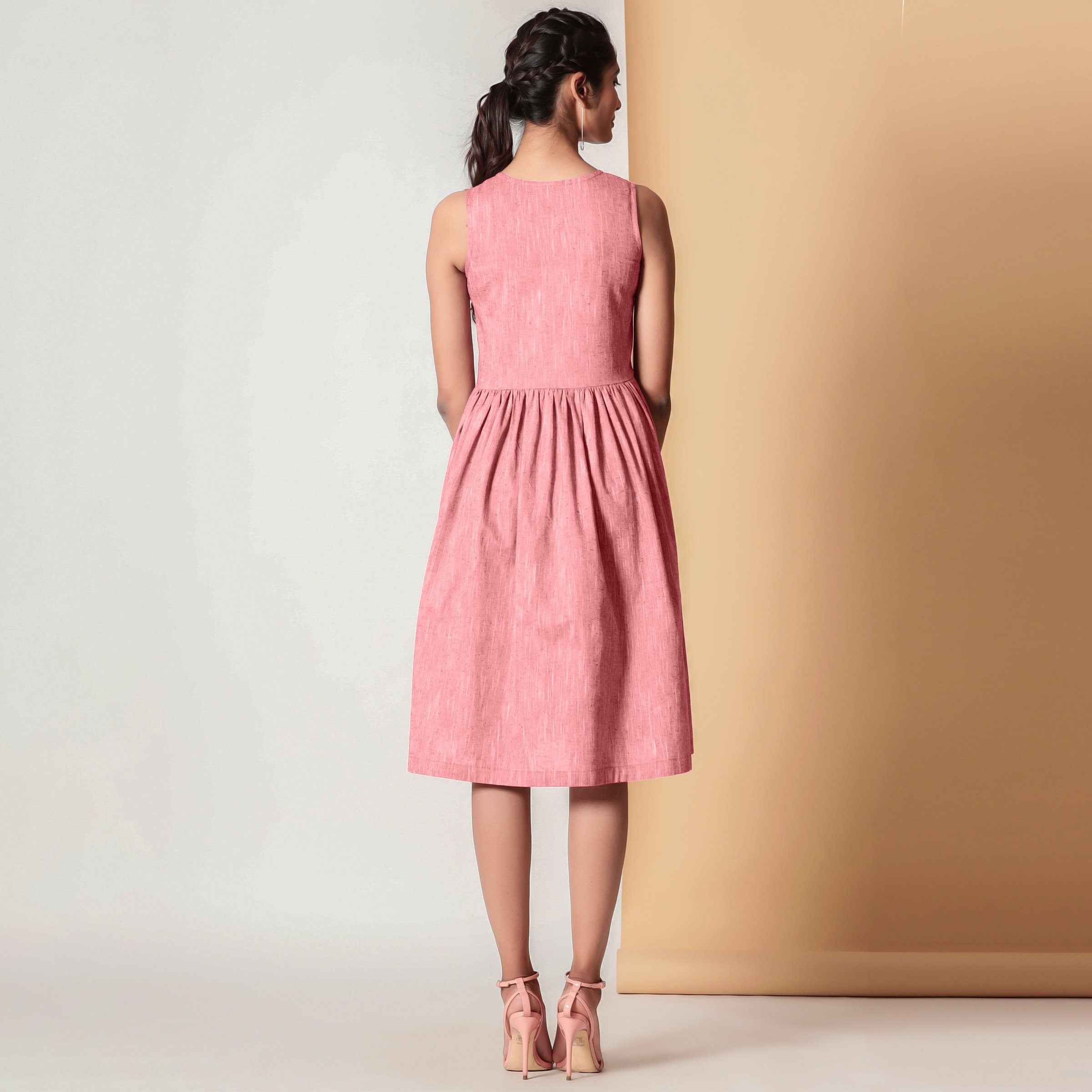 Back View of a Model wearing Red Yarn Dyed Gathered Yoke Dress