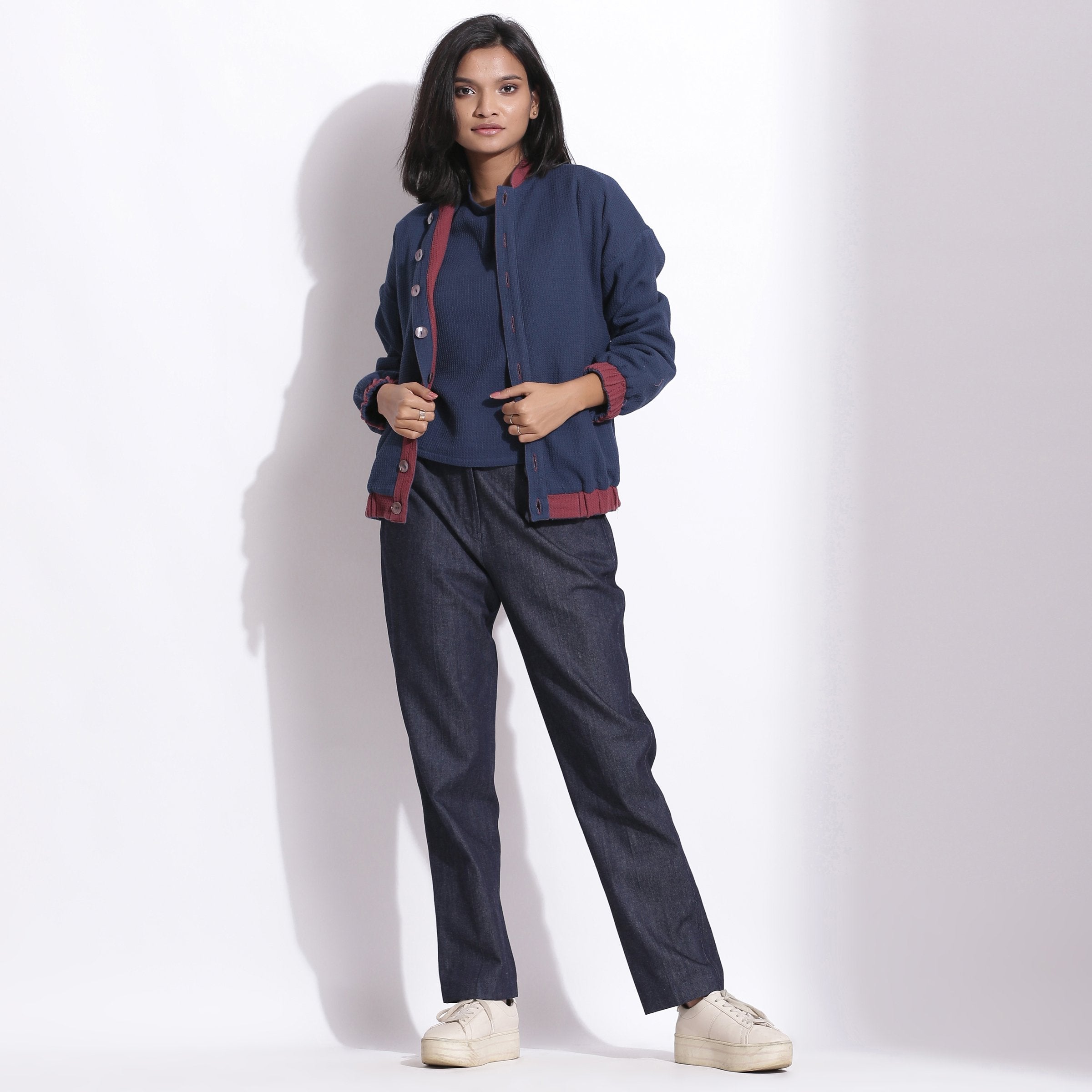 Front View of a Model wearing Reversible Blue Red Warm Cotton Waffle Bomber Jacket