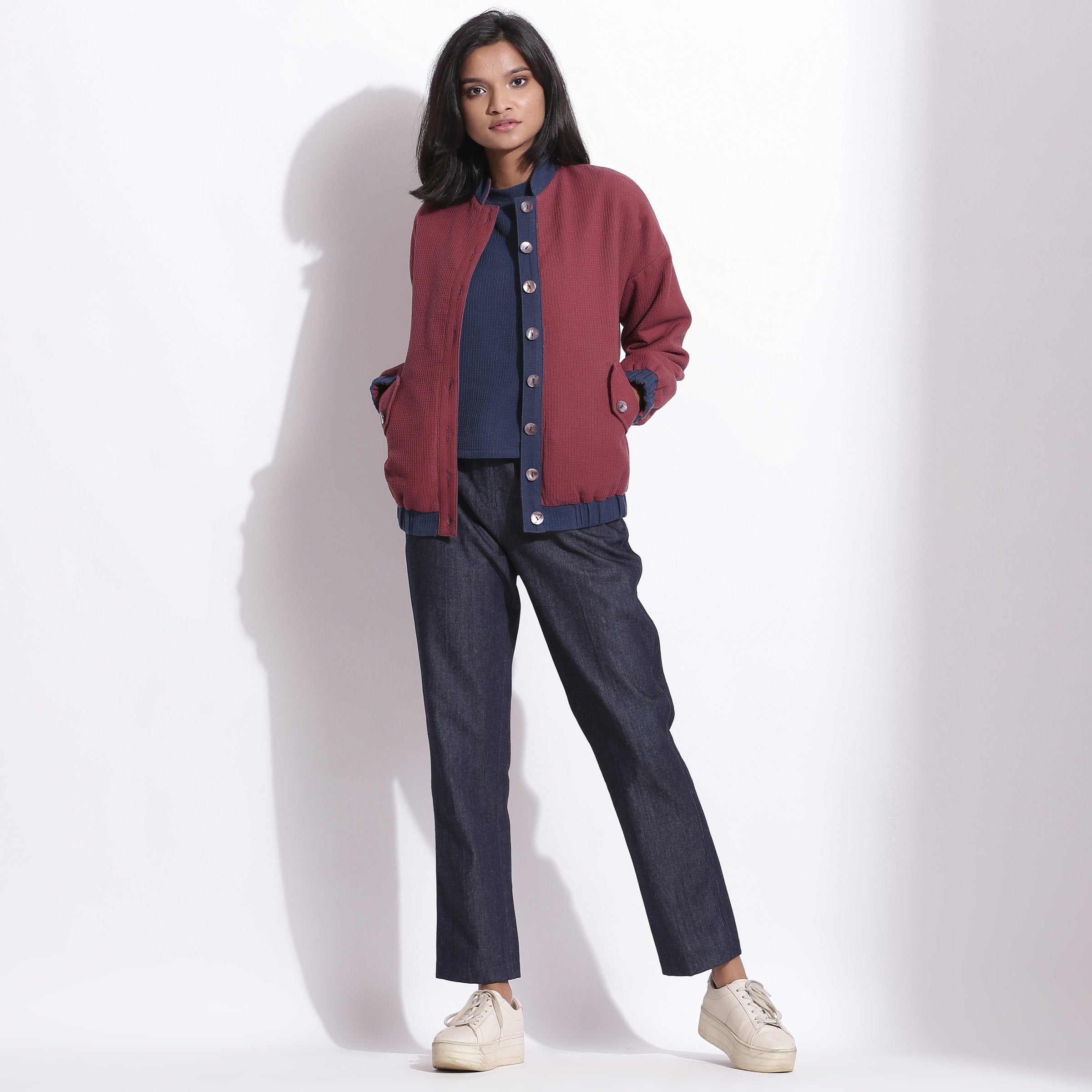 Front View of a Model wearing Reversible Blue Red Warm Cotton Waffle Bomber Jacket