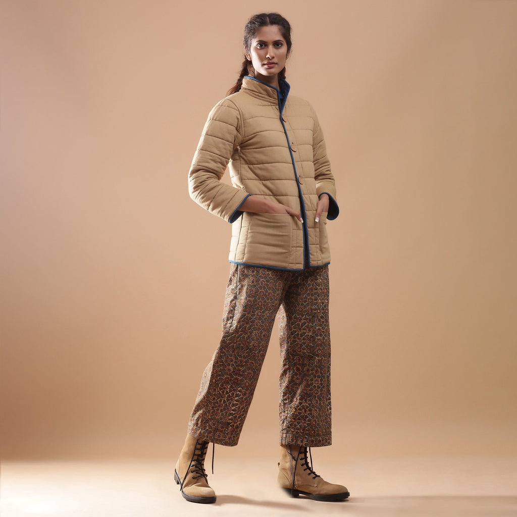 Right View of a Model wearing Blue Reversible Detachable Quilted Cotton Hoodie Jacket