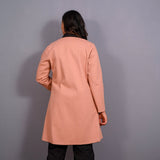 Back View of a Model wearing Reversible English Rose and Black Warm Cotton Flannel Front Open Overlay Coat