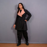 Front View of a Model wearing Reversible English Rose and Black Warm Cotton Flannel Front Open Overlay Coat