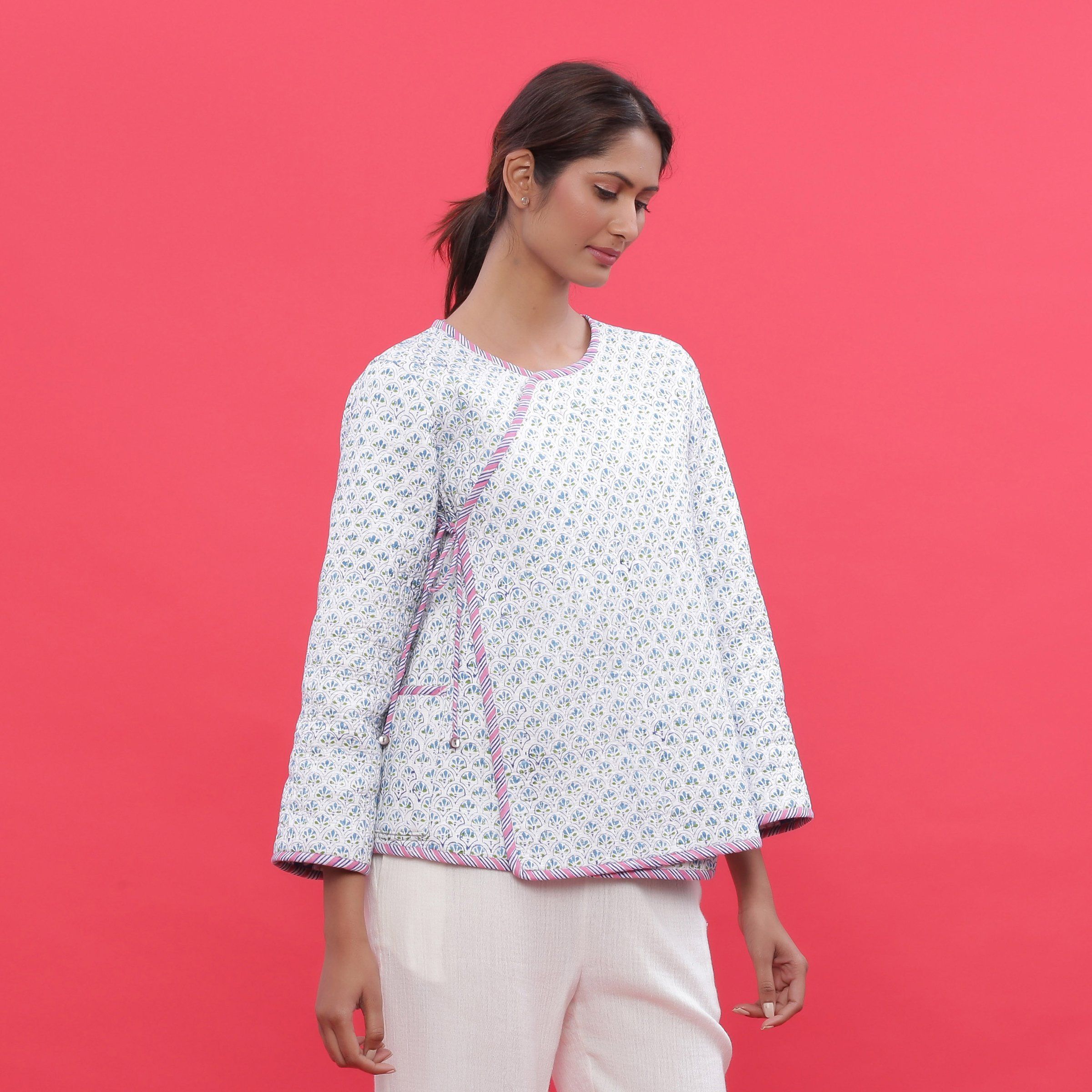 Right View of a Model wearing Reversible Block Print Quilted Cotton Short Jacket