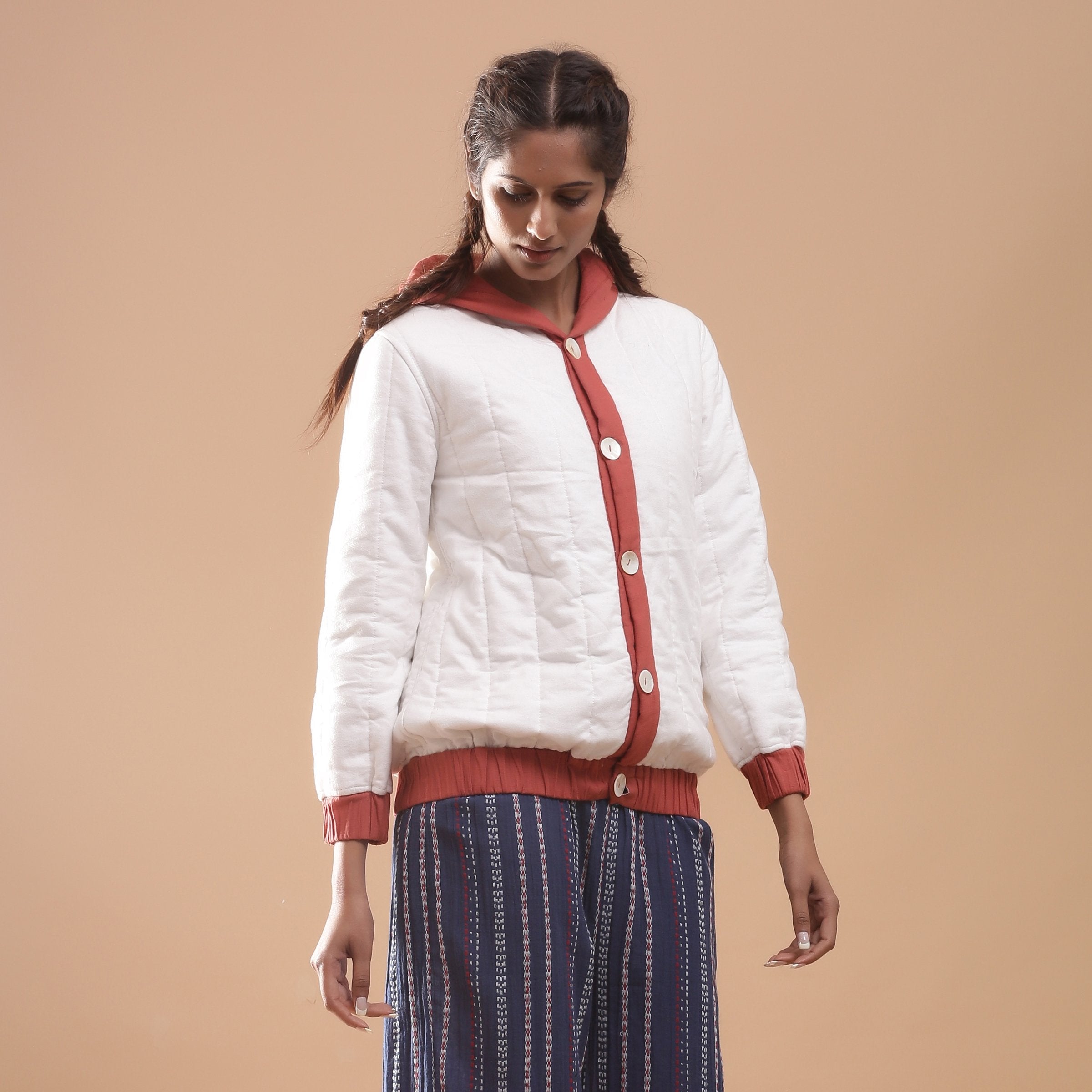 Right View of a Model wearing Reversible Warm Cotton Quilted Bomber Hoodie Jacket