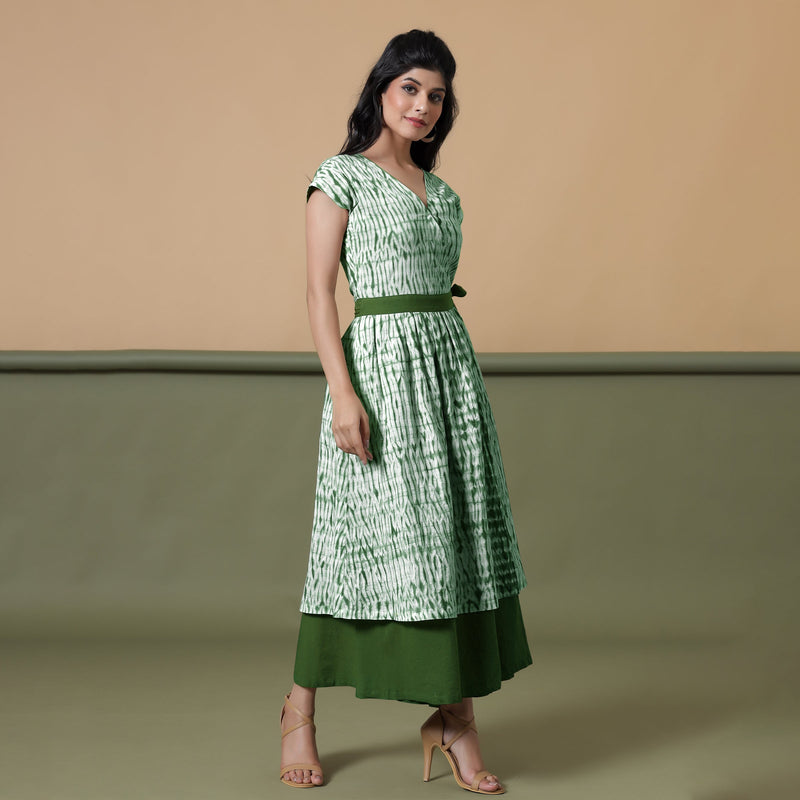 Right View of a Model wearing Reversible Forest Green Tie-Dye Cotton Maxi Wrap Dress