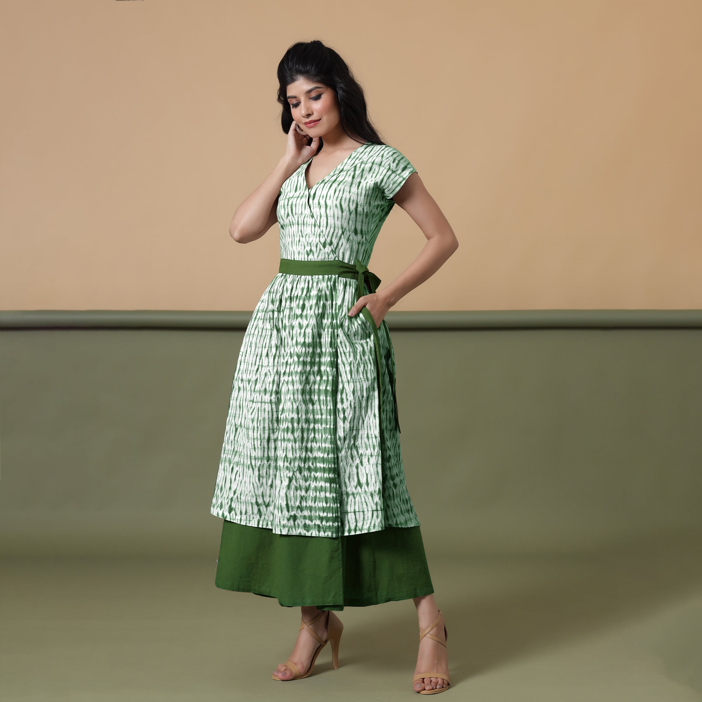Left View of a Model wearing Reversible Forest Green Tie-Dye Cotton Maxi Wrap Dress