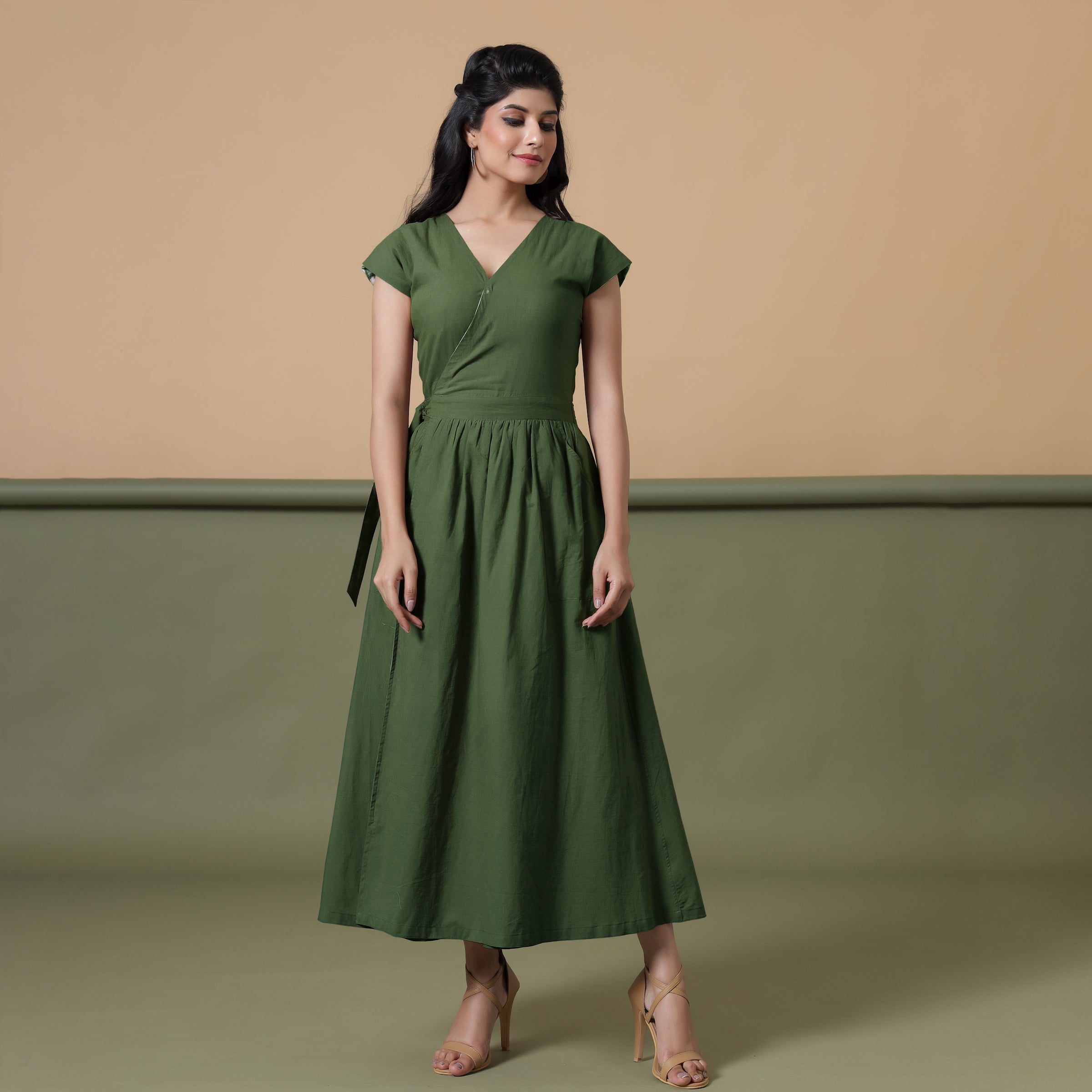 Front View of a Model wearing Reversible Forest Green Tie-Dye Cotton Maxi Wrap Dress