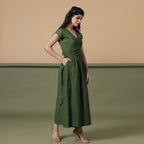 Right View of a Model wearing Reversible Forest Green Tie-Dye Cotton Maxi Wrap Dress