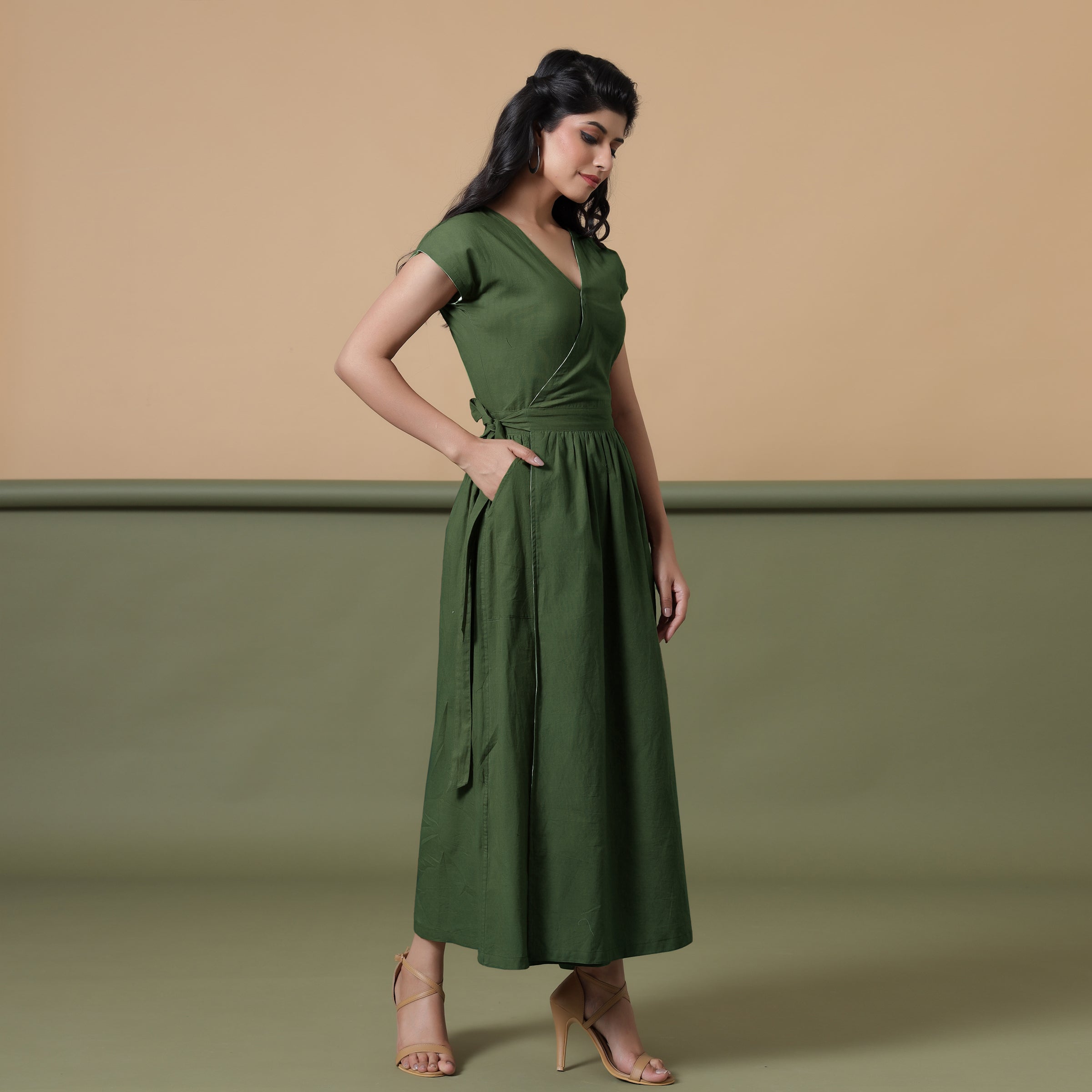 Right View of a Model wearing Reversible Forest Green Tie-Dye Cotton Maxi Wrap Dress