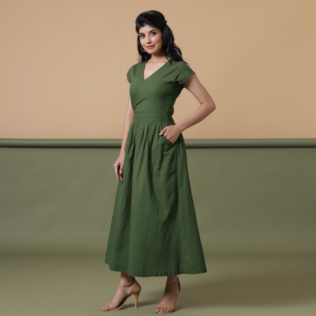 Left View of a Model wearing Reversible Forest Green Tie-Dye Cotton Maxi Wrap Dress